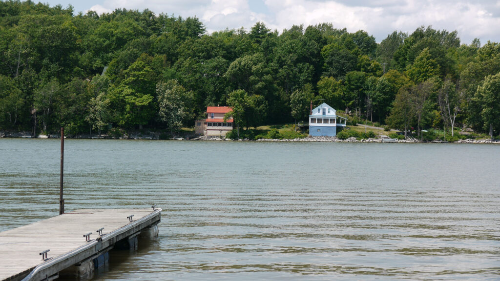 Lakeside camps across the water from a floating dock