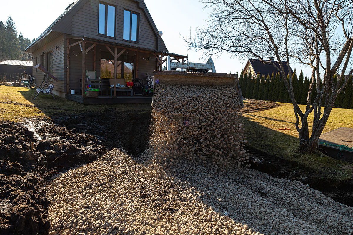 Sugarhouse Construction Services and Excavation installing a gravel driveway